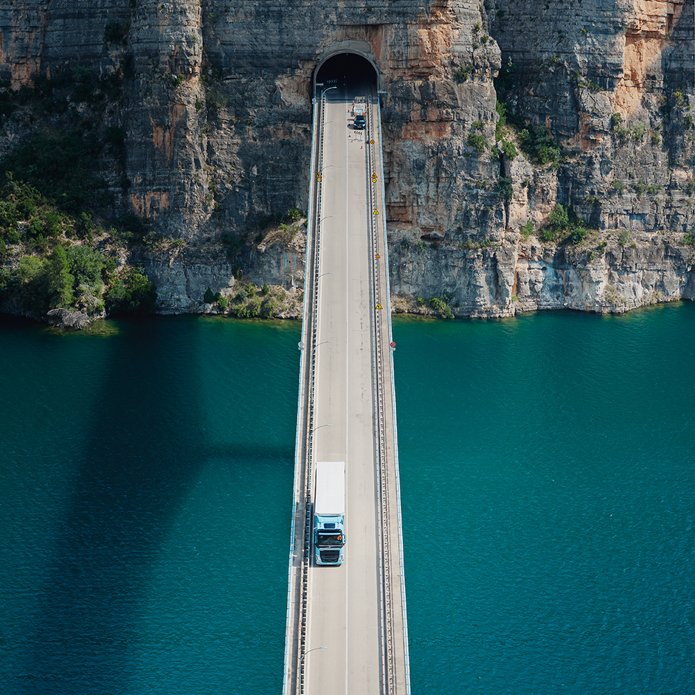 Volvo FH LNG driving over a bridge.